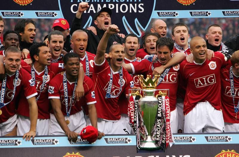 United players celebrate winning the title in the 2006-7 season with 89 points. Getty