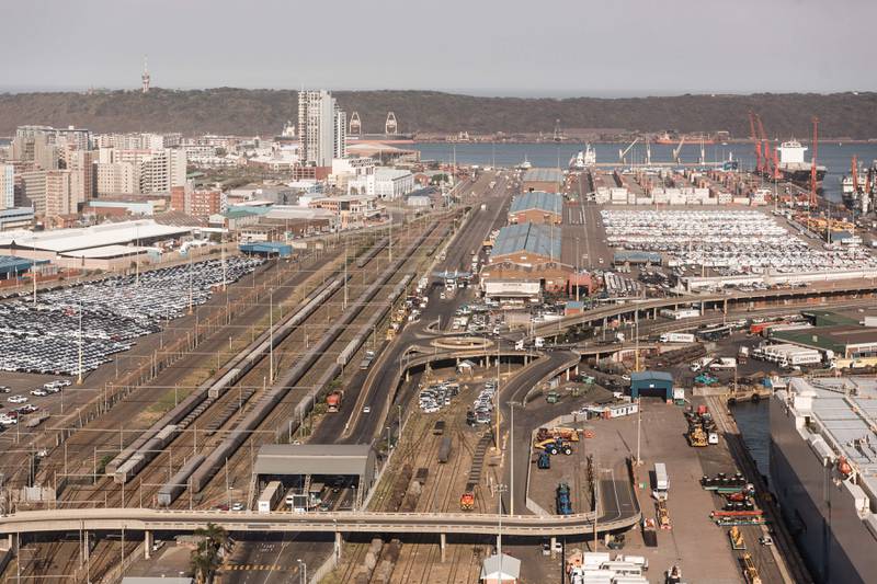 Lorries and cargo vessels at the Port of Durban in South Africa that was forced to close in July because of riots. AFP