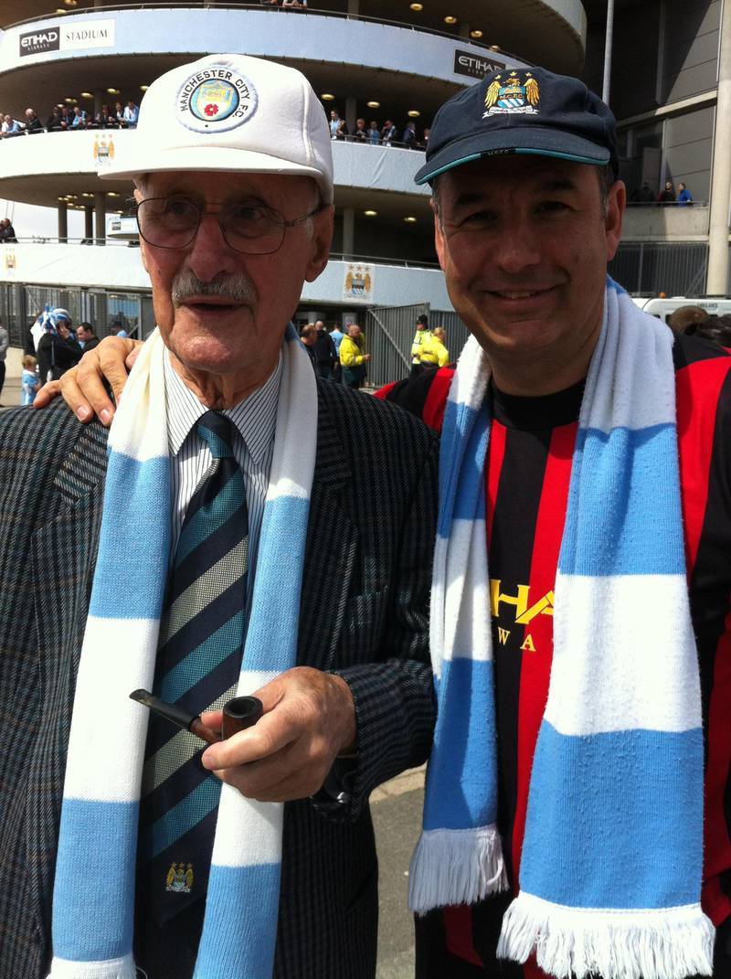 Geoffrey Rothband and his son Nigel outside the Etihad Stadium after the Sergio Aguero later winner gave City the title in 2012