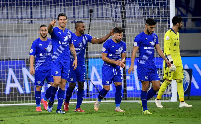 Sebastian Tagliabue (second from left) reacts after scoring in Al Nasr’s 2-1 win over Sharjah in the Arabian Gulf League at the Al Maktoum stadium on Sunday, March 8, 2021. Courtesy PLC
