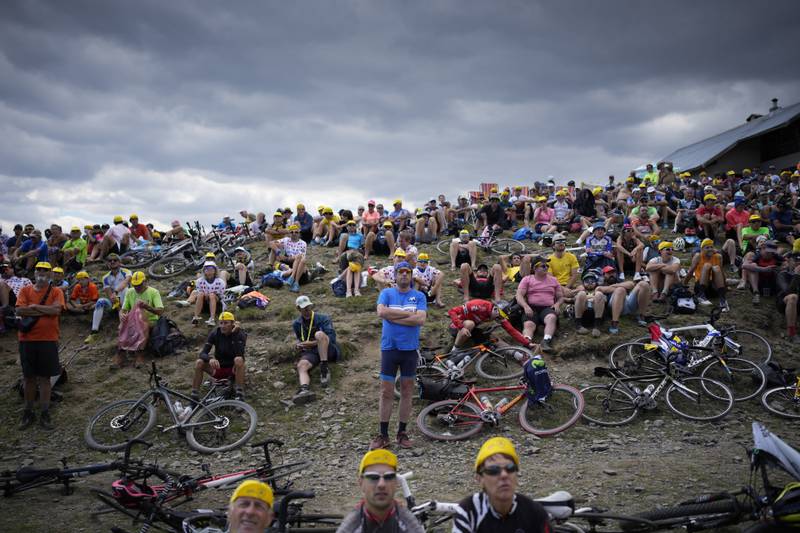 Spectators wait for the riders on Granon pass. AP