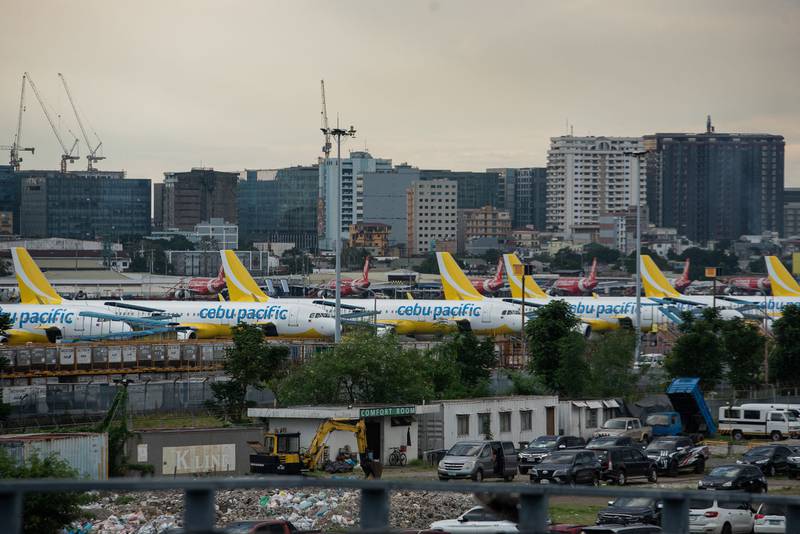 Cebu Pacific planes are parked at Ninoy Aquino International Airport in Pasay, Manila, the Philippines. All photos: AFP