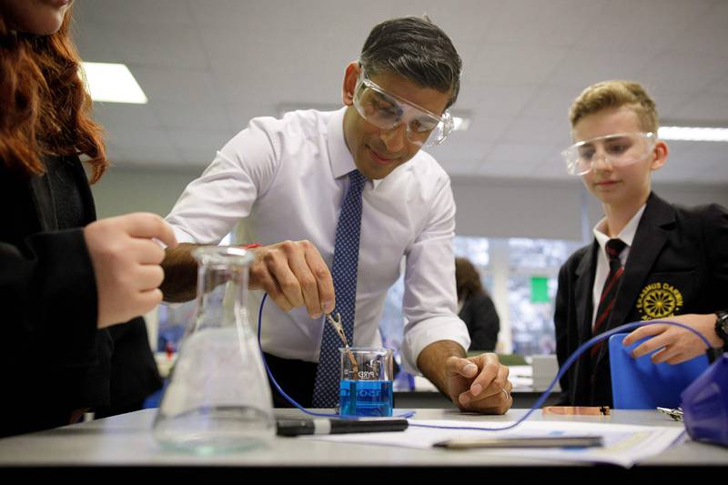 Britain's Prime Minister Rishi Sunak visited a chemistry class at Erasmus Darwin Academy in Burntwood on Monday. AFP