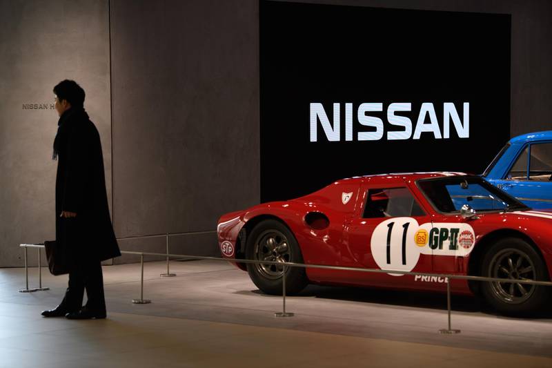 Vehicles stand on display in a showroom at the Nissan Motor Co. headquarters in Yokohama, Japan, on Thursday, Feb. 13, 2020. Nissan cut its full-year profit outlook for the second time in as many quarters and scrapped its year-end dividend, renewing concern about the troubled automaker’s ability return cash to investors, especially top shareholder and partner Renault SA. Photographer: Akio Kon/Bloomberg