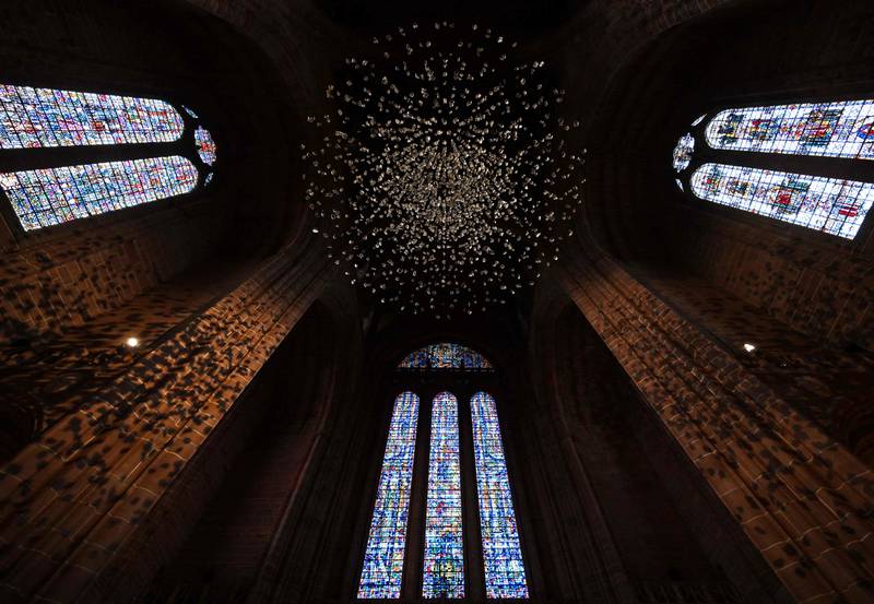 An art installation called Coalescence by British designer Paul Cocksedge, is unveiled at Liverpool Cathedral, north-west England. It comprises thousands of pieces of coal. AFP