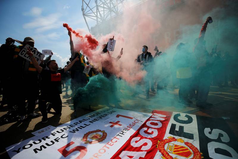Manchester United fans protest against the club's owners outside Old Trafford that resulted in the Premier League game with Liverpool being called off in May, 2021. Reuters