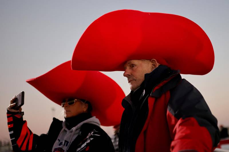Supporters of US President Donald Trump are pictured at Rochester International Airport in Rochester, Minnesota, US, October 30, 2020. Reuters