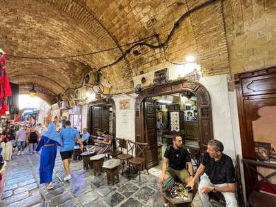 Patrons relax at the Zitouna cafe near the landmark Zitouna Mosque at the heart of the medina in Tunis. Ghaya Ben Mbarek / The National