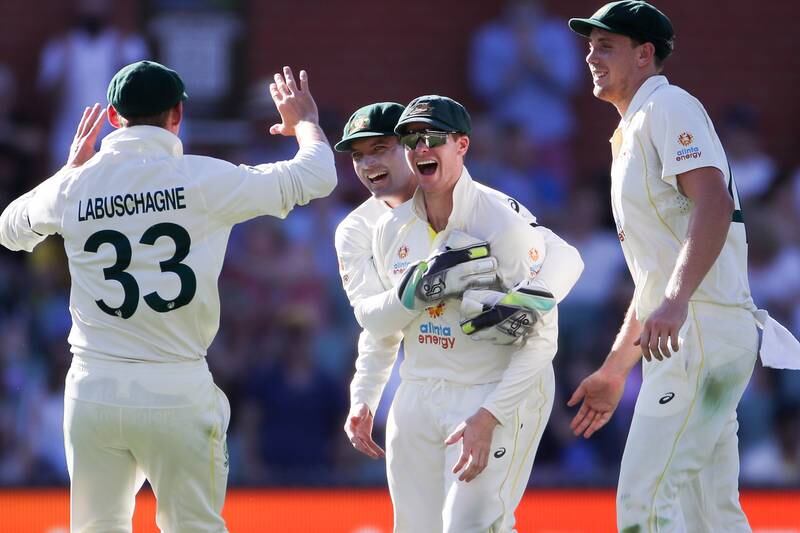 Steve Smith of Australia celebrates after taking the catch of Dawid Malan on day three of the second Ashes Test at the Adelaide Oval on Saturday, December 18, 2021. EPA