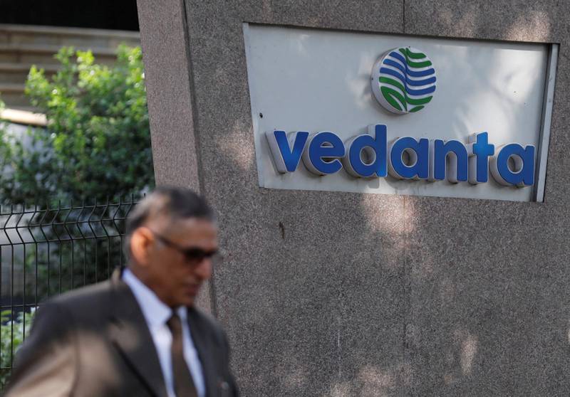 A man walks past the logo of Vedanta outside its headquarters in Mumbai, India. Reuters