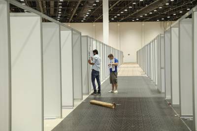 Workers help to fit out the vast medical facility