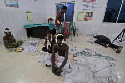 Injured passengers at a hospital in Balasore district. AP