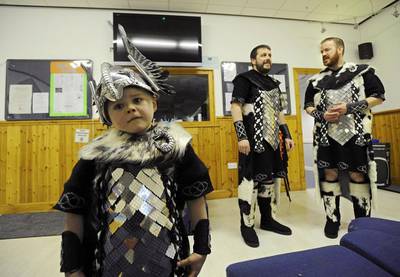 Young and old dress up as a Viking for the occasion. Andy Buchanan / AFP Photo