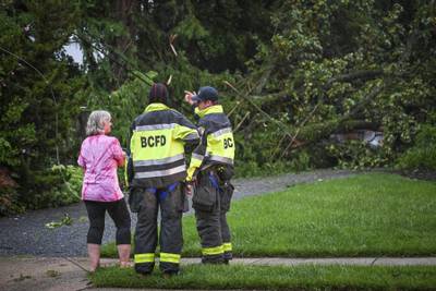 Assessing the damage caused by a storm in Maryland. The Baltimore Sun / AP