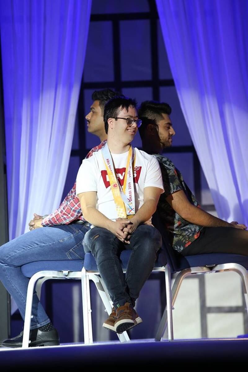 From left, Johann Mendes, Santiago Fraser and Zia Mirza perform a dramatic piece about overcoming struggles in the 2019 event.