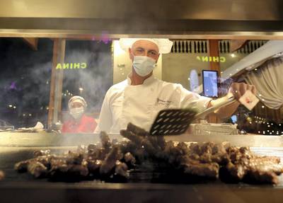 Dubai, United Arab Emirates - Reporter: Janice Rodrigues. Lifestyle. Food. A chef makes Bosnian kebabs. Food vendors from all over the world at Gobal Village. Dubai. Sunday, January 17th, 2021. Chris Whiteoak / The National