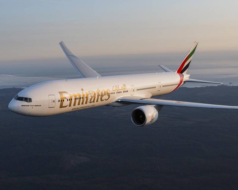 Emirates Boeing 777-300ER photographed on August 17, 2015 from Wolfe Air Aviation's Lear 25B.