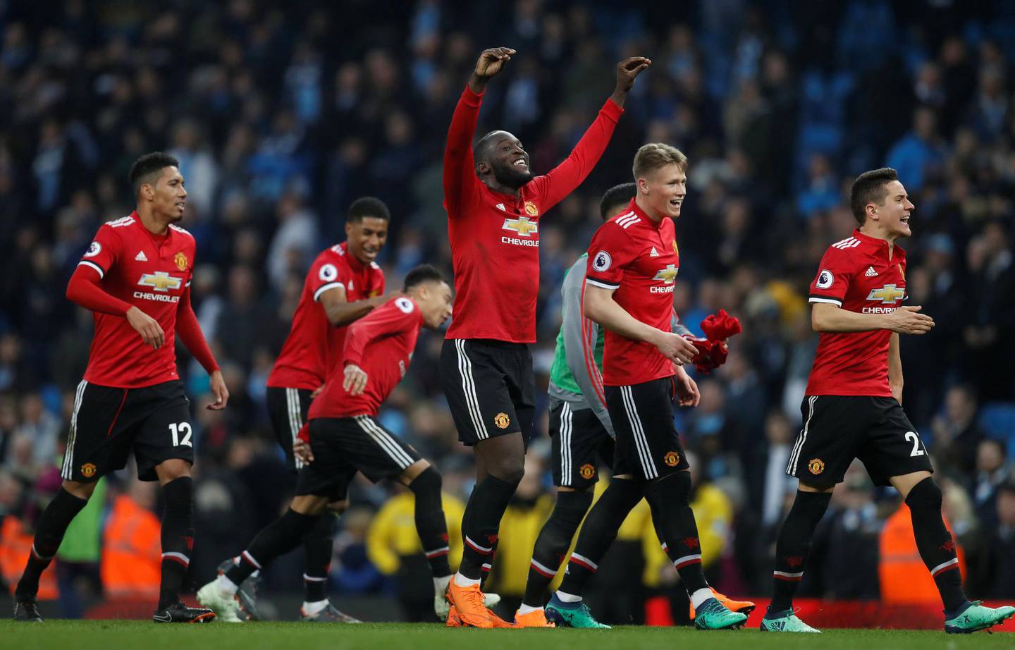 Soccer Football - Premier League - Manchester City vs Manchester United - Etihad Stadium, Manchester, Britain - April 7, 2018   Manchester United's Romelu Lukaku and team mates celebrate after the match                        REUTERS/Russell Cheyne    EDITORIAL USE ONLY. No use with unauthorized audio, video, data, fixture lists, club/league logos or "live" services. Online in-match use limited to 75 images, no video emulation. No use in betting, games or single club/league/player publications.  Please contact your account representative for further details.