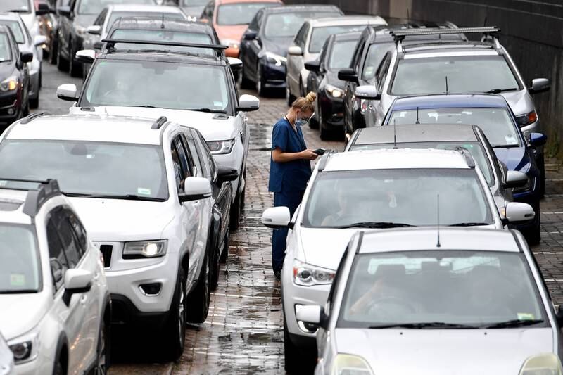 Car queue at a drive-through testing centre at Bondi Beach, in Sydney, Australia. New South Wales has broken another daily record for Covid-19 case numbers as Omicron takes hold, with hospital admissions almost doubling in a week. EPA