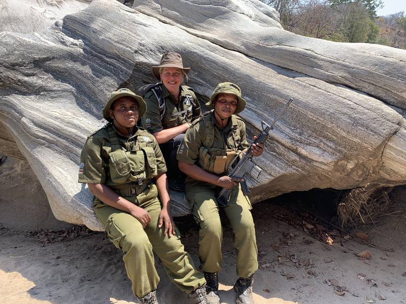 Holly Budge, founder of How Many Elephants, with wildlife rangers in Zimbabwe. Photo: How Many Elephants
