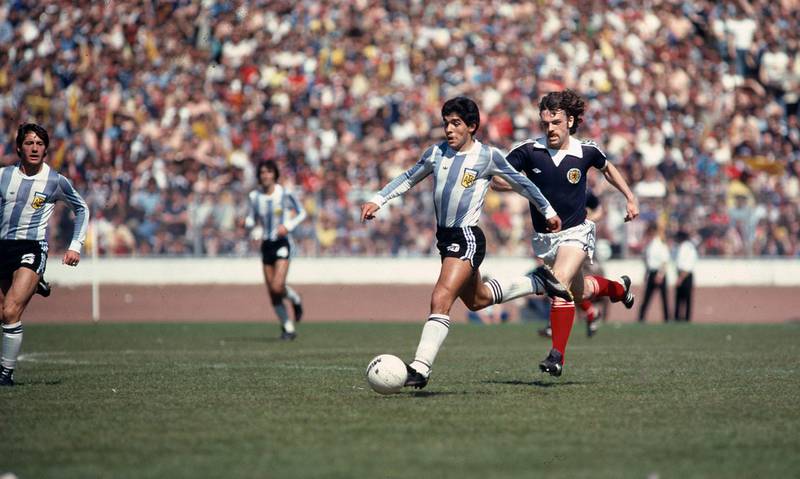 02 June 1979 - International football - Scotland v Argentina Diego Maradona runs with the ball as John Wark tries to keep up with the young Argentinian.. (Photo by Mark Leech/Getty Images)