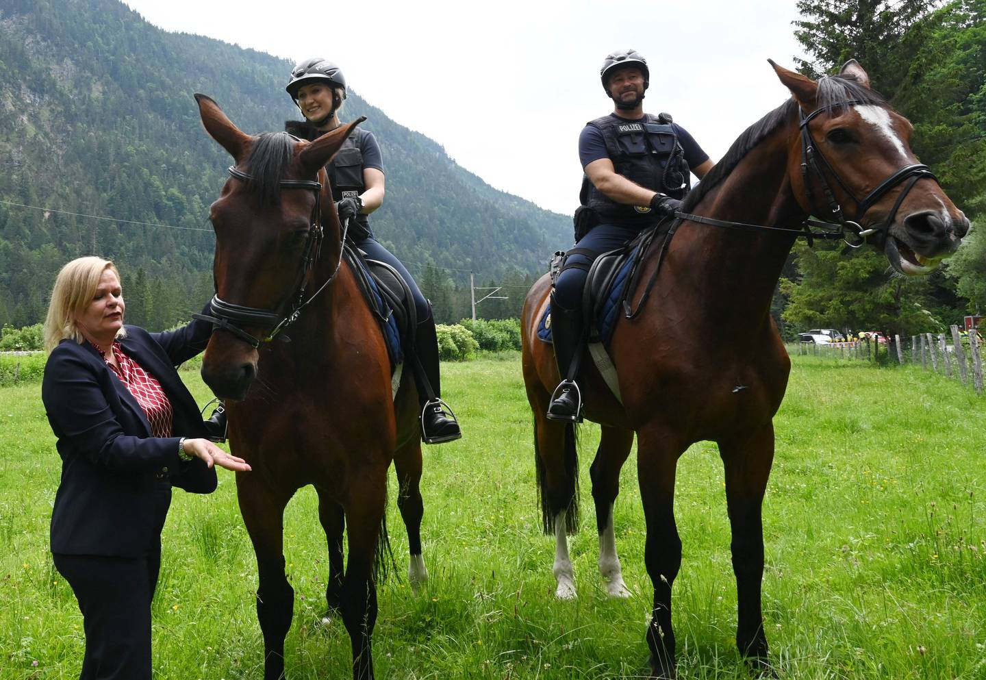 German Interior Minister Nancy Faeser, left, inspects the security operation around the G7 summit in Bavaria. AFP 