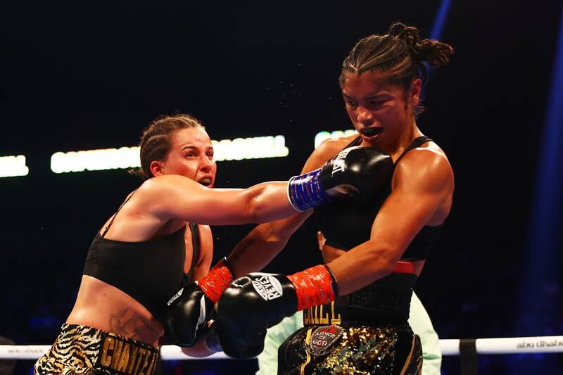 Chantelle Cameron throws a right at Jessica McCaskill. Getty