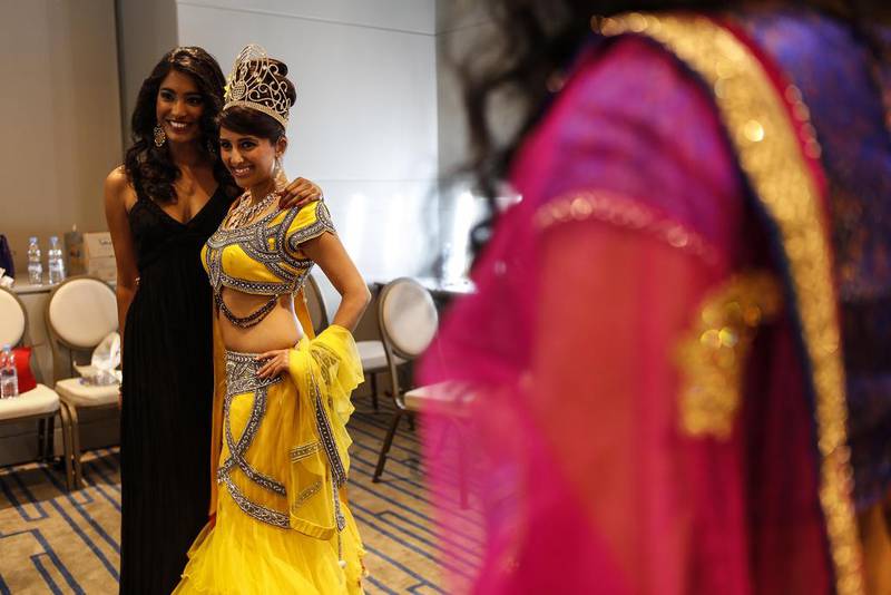 From left to right: Ornella Maureemootoo (France) poses with the 2013 winner Nehal Bhogaita back stage.