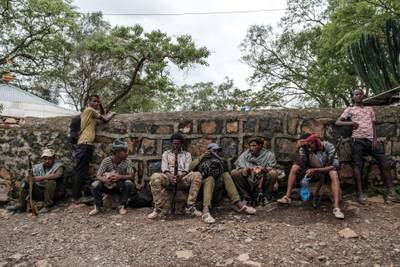 Fighters from the Amhara militia rest take a break. The Amhara government said its forces would go into 'attack mode' in an effort to reverse Tigrayan gains. AFP