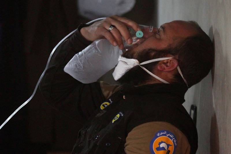 A civil defence member breathes through an oxygen mask after a toxic gas attack in the town of Khan Sheikhoun in rebel-held Idlib, Syria. Reuters