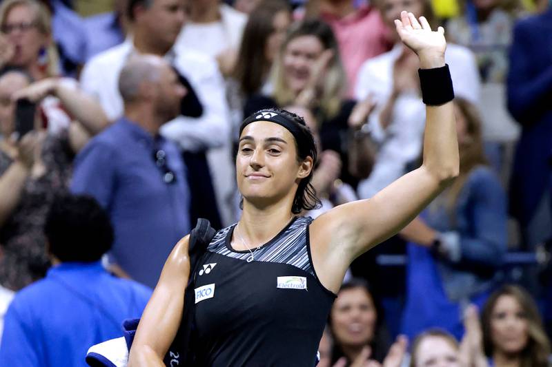 Caroline Garcia waves to the crowd after losing to Ons Jabeur. AFP