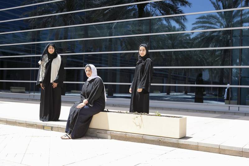 Reem Al Hammadi, left, Ayesha Khoory and Shaima Badri have been educating high-school pupils. Reem Mohammed / The National