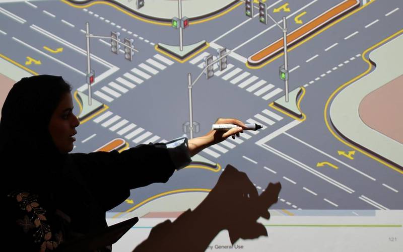 The instructor explains the theory of negotiating a cross-roads Ahmed Jadallah / Reuters