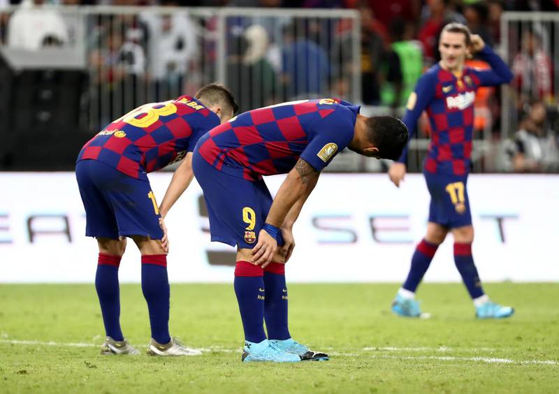 Barcelona players after the match. Reuters