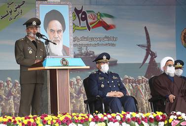 Iranian Army Commander-in-chief Abdolrahim Mousavi addresses a military parade. Iranian Army/ EPA / HO