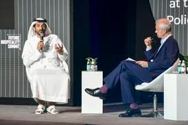 The UAE’s Minister of Economy, Abdulla bin Touq Al Marri, left, and BBC presenter Stephen Sackur at the Future Hospitality Summit in Abu Dhabi. Khushnum Bhandari / The National