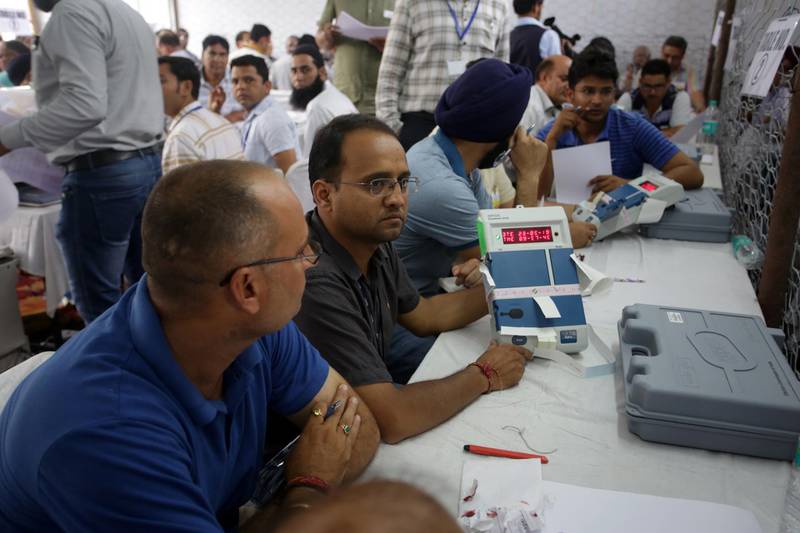 Election officials count votes in Jammu, the winter capital of the Indian-controlled section of Kashmir. EPA