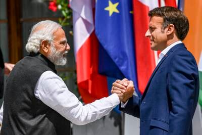 Indian Prime Minister Narendra Modi, left, greets France's President Emmanuel Macron at Elmau Castle in Kruen, Germany, in June 2022. EPA