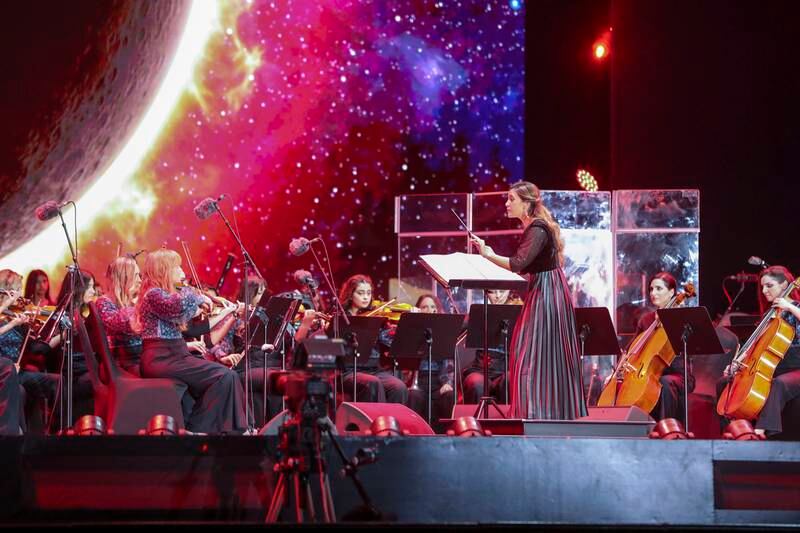 The Jubilee Stage at Expo 2020 Dubai is lit up by the Firdaus Orchestra. Khushnum Bhandari / The National