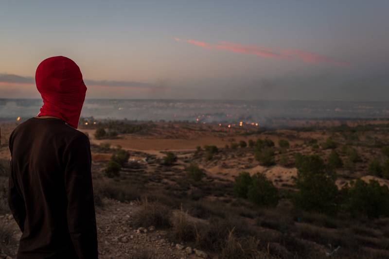 "We're choking on the air here," said a young protester in Agareb on Wednesday as he surveyed the tear gas and fires across from the large landfill on the outskirts of the town. Photo: Erin Clare Brown / The National