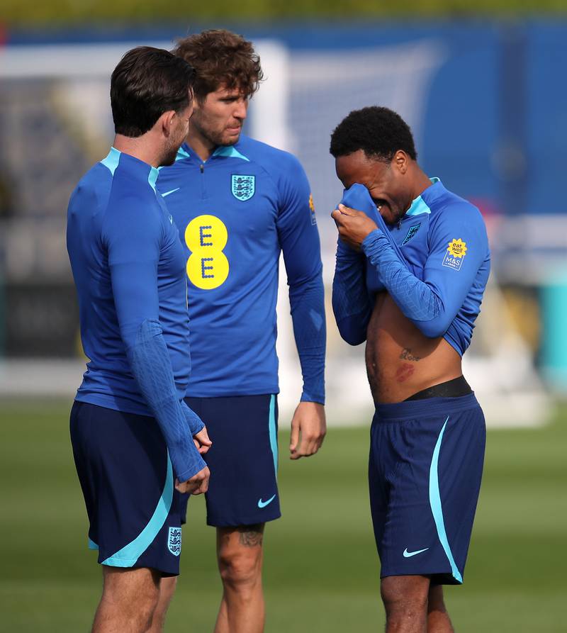Raheem Sterling, right, during a training session at St. George's Park. PA