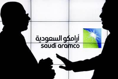 A Saudi Arabian Oil Co. (Aramco) logo sits on an electronic display at the company's corporate pavilion during the 22nd World Petroleum Congress in Istanbul, Turkey, on Wednesday, July 12, 2017. Oil fell from the lowest closing price in two weeks as talk of Libya and Nigeria being requested to cap their production failed to dispel doubts about the effectiveness of OPEC’s cut. Photographer: Kostas Tsironis/Bloomberg
