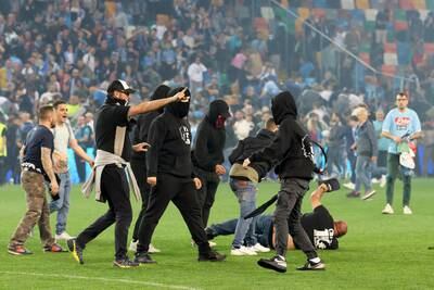 Clashes between rival Napoli and Udinese supporters at the end of the match at the Friuli - Dacia Arena stadium in Udine. EPA