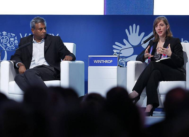 Salil Shetty, secretary general of Amnesty International, left, listens to Rebecca Winthrop, director of the Brookings Institution, during a panel discussion at the Global Education and Skills Forum. Jeffrey E Biteng / The National