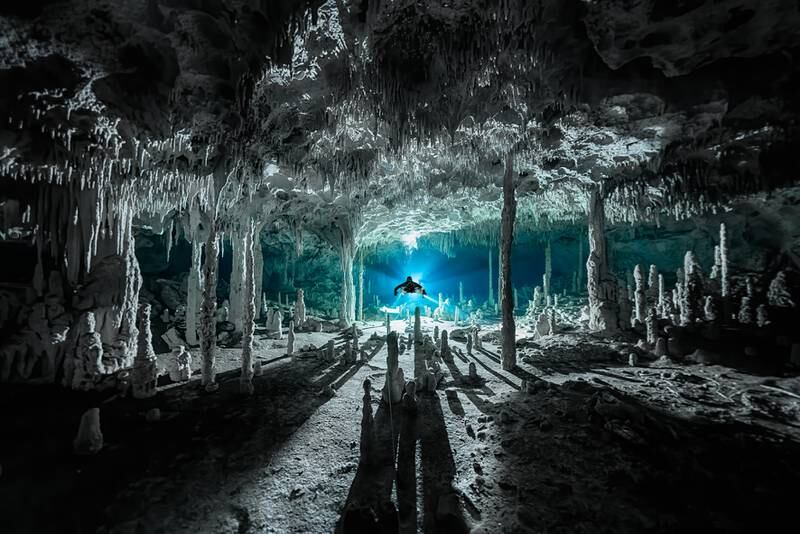 Winner of Exploration Photographer of the Year, Martin Broen: Speleothems cast long shadows at cenote Dos Pisos in Quintana Roo, Mexico
