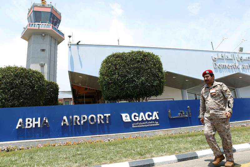 A security officer walks past Saudi Arabia's Abha airport in 2019. The airport, close to the Yemeni border, has become a regular target for the Houthis. Reuters