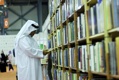 Sharjah, 03, Nov, 2017: Visitor take a look at the books during the Sharjah International Book Fair at the Sharjah Expo Centre in Sharjah. Satish Kumar for the National / Story by Saeed Saeed