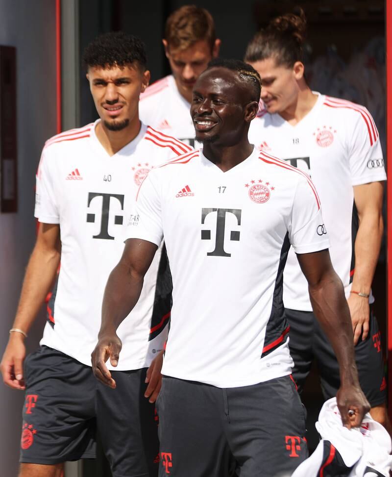 Sadio Mane walks on to the Bayern training pitch.
