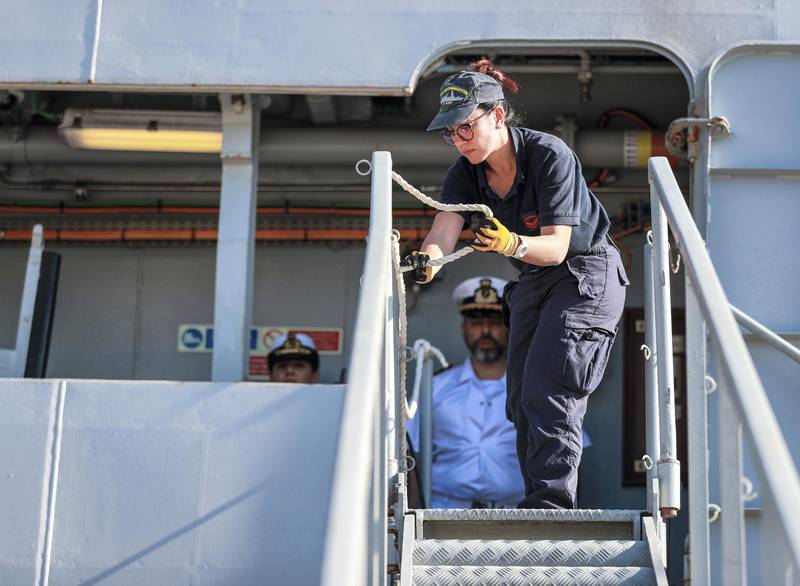 Abu Dhabi, U.A.E., February 14, 2019.  European Multi-Mission Frigate (FREMM), Carlo Margottini has docked at the Abu Dhabi Port with Commander Marco Guerriero.  -- a crew member prapares the ladders to welcome the Italian Ambassador of the UAE,  Liborio Stellino to the frigate.Victor Besa/The NationalSection:  NAReporter:  Charlie Mitchell