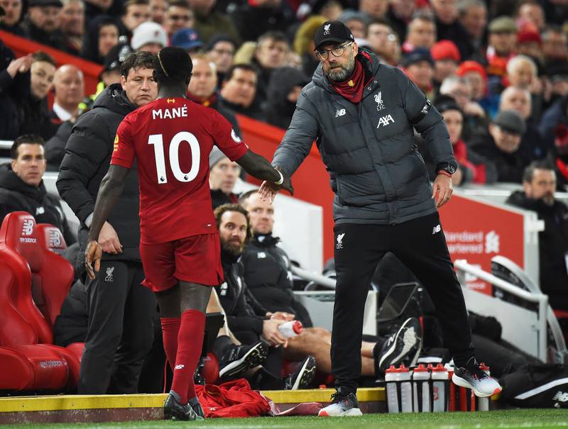Liverpool manager Juergen Klopp shakes hands with Sadio Mane. Reuters
